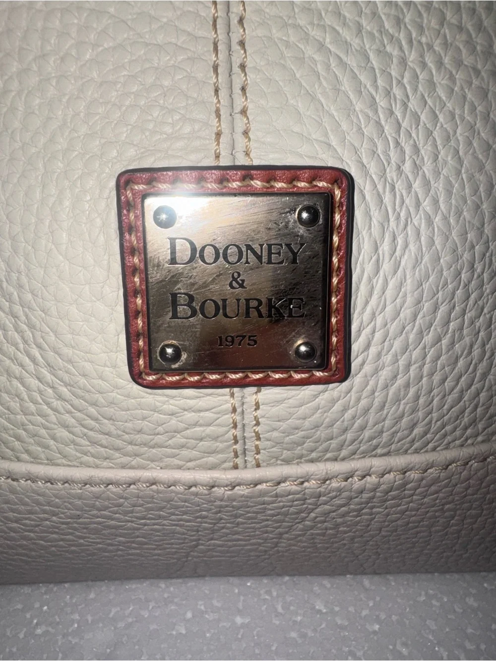 Dooney & Bourke Cream Leather Hobo with Brown Trim and Tassel